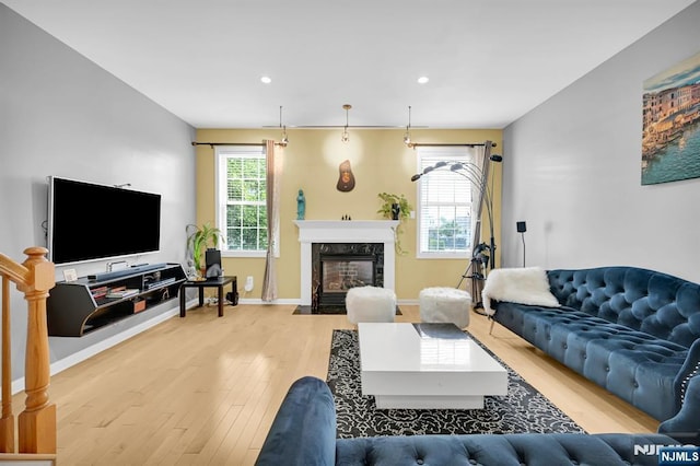 303 Wilshire Dr, Nutley, NJ 07110 - living area with light wood-style floors, a fireplace, and recessed lighting