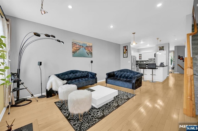 303 Wilshire Dr, Nutley, NJ 07110 - living room featuring recessed lighting and light wood-type flooring