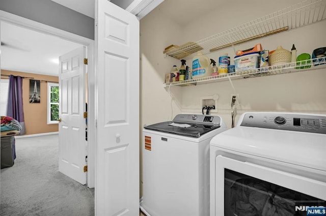 303 Wilshire Dr, Nutley, NJ 07110 - laundry area with washer and dryer and light colored carpet