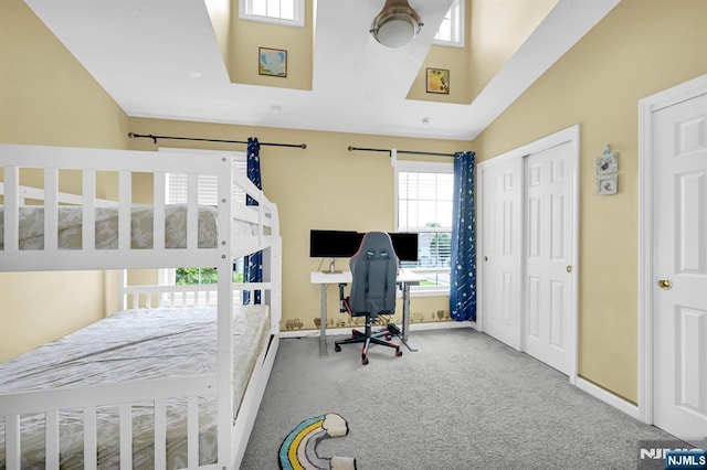 303 Wilshire Dr, Nutley, NJ 07110 - carpeted bedroom with an office area and a closet