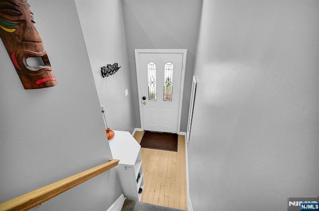 303 Wilshire Dr, Nutley, NJ 07110 - foyer entrance featuring baseboards and wood-type flooring