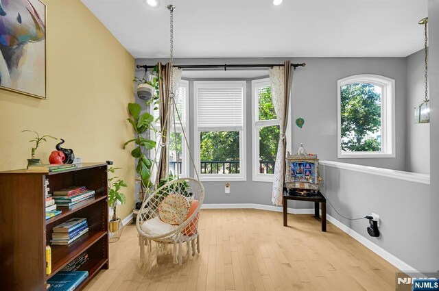 303 Wilshire Dr, Nutley, NJ 07110 - sitting room with wood finished floors and recessed lighting