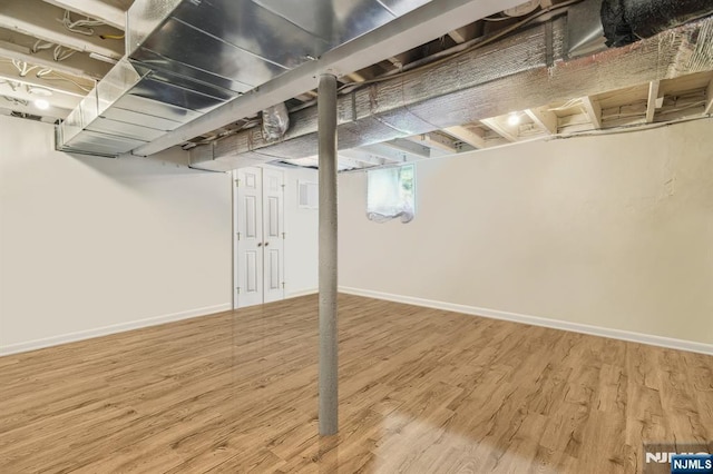 322 3rd St, Saddle Brook, NJ 07663 - basement with wood finished floors