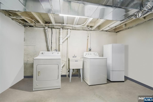 322 3rd St, Saddle Brook, NJ 07663 - washroom with washing machine and clothes dryer