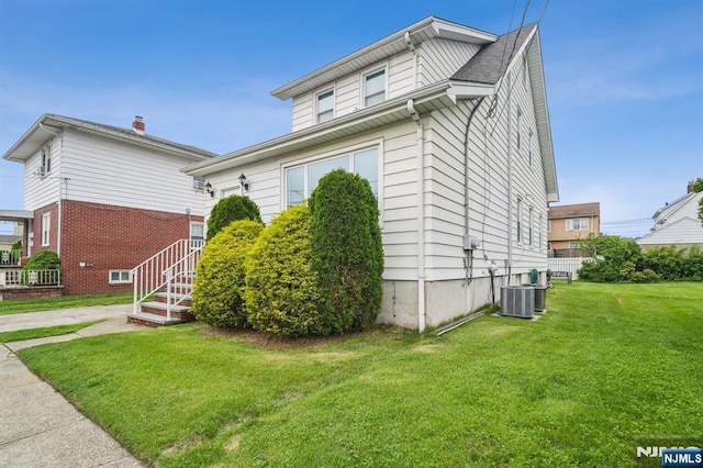 322 3rd St, Saddle Brook, NJ 07663 - view of front facade with a front lawn