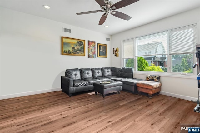 322 3rd St, Saddle Brook, NJ 07663 - living room featuring light wood-style flooring, ceiling fan, and recessed lighting