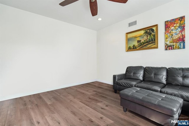 322 3rd St, Saddle Brook, NJ 07663 - living area with wood finished floors, ceiling fan, and recessed lighting
