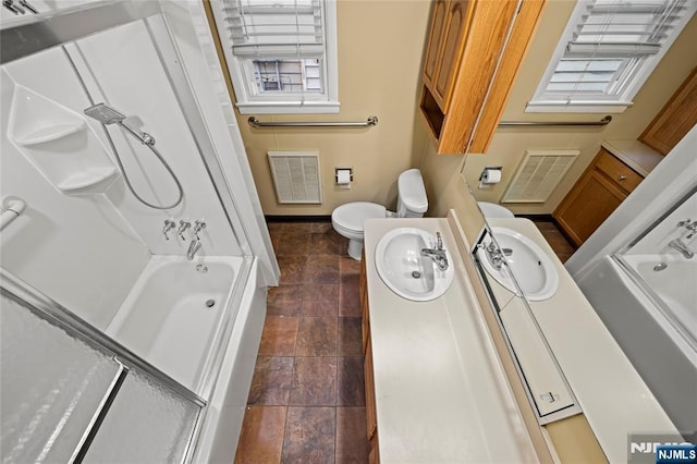 115 12th St, Prospect Park, NJ 07508 - full bathroom with vanity, stone tile flooring, and  shower combination