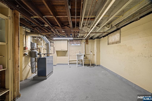 115 12th St, Prospect Park, NJ 07508 - below grade area featuring a heating unit