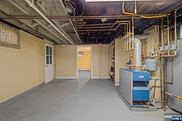 115 12th St, Prospect Park, NJ 07508 - unfinished below grade area featuring a heating unit, water heater, and baseboard heating