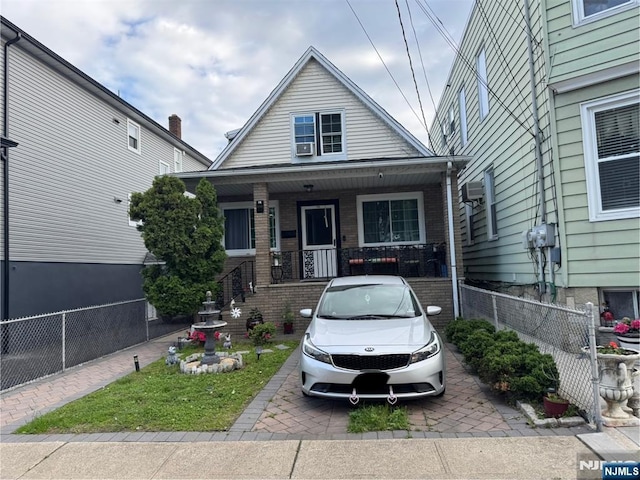 188 Hoyt St, Kearny, NJ 07032 - view of front of home featuring covered porch and brick siding