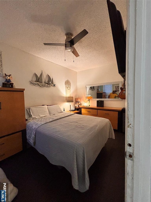 188 Hoyt St, Kearny, NJ 07032 - bedroom featuring a textured ceiling and ceiling fan