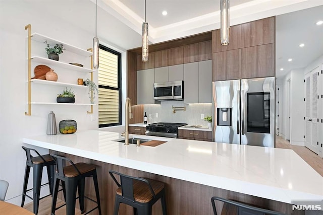 29 Armstrong Ave Unit 3, Jersey City, NJ 07305 - kitchen with appliances with stainless steel finishes, open shelves, decorative backsplash, modern cabinets, and recessed lighting
