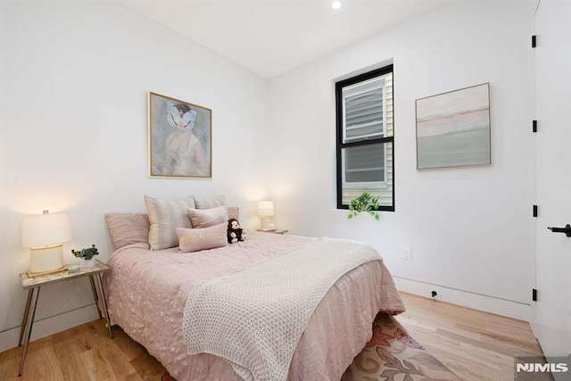 29 Armstrong Ave Unit 3, Jersey City, NJ 07305 - bedroom with light wood-style floors and recessed lighting
