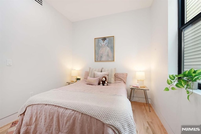 29 Armstrong Ave Unit 3, Jersey City, NJ 07305 - bedroom with wood finished floors and baseboards