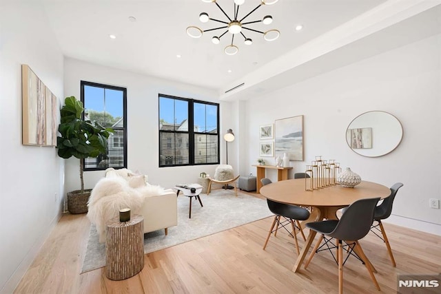 29 Armstrong Ave Unit 3, Jersey City, NJ 07305 - dining area with light wood-style flooring, a chandelier, and recessed lighting