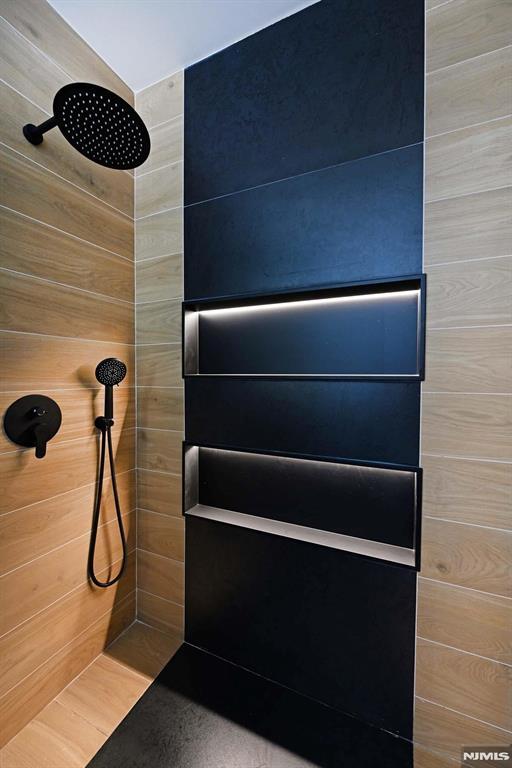 29 Armstrong Ave Unit 3, Jersey City, NJ 07305 - bathroom view of a tile shower