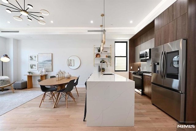 29 Armstrong Ave Unit 3, Jersey City, NJ 07305 - kitchen featuring stainless steel appliances, modern cabinets, light wood-type flooring, open shelves, and recessed lighting