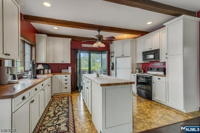 19 Division Ln, Byram, NJ 07821 - kitchen featuring black microwave, electric stove, wooden counters, freestanding refrigerator, and ceiling fan