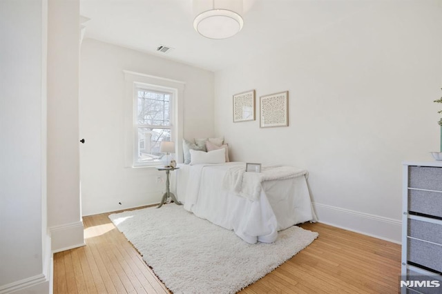 46 Oak Ridge Ave, Nutley, NJ 07110 - bedroom with wood-type flooring and baseboards