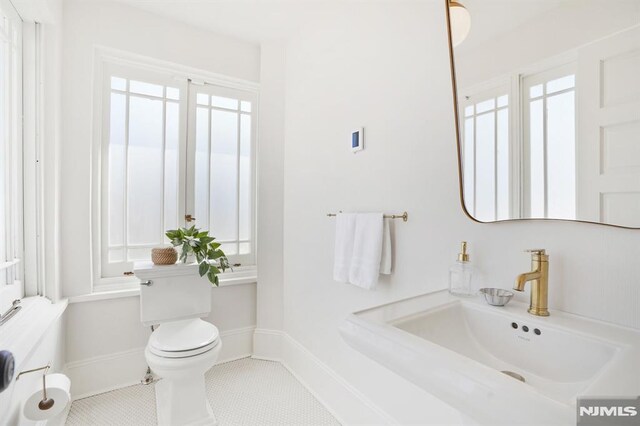 46 Oak Ridge Ave, Nutley, NJ 07110 - bathroom featuring a sink and tile patterned floors