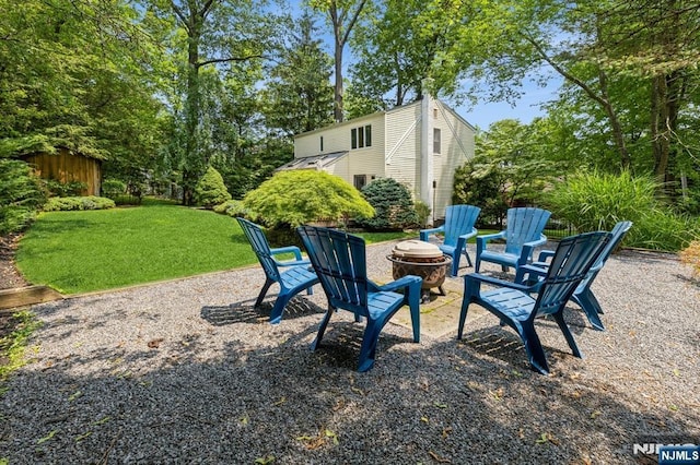 41 Roosevelt St, Cresskill, NJ 07626 - view of grassy yard with a fire pit