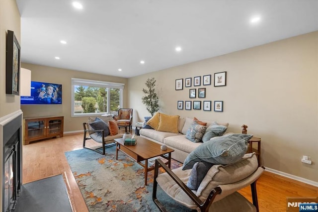 206 Wind Hollow Ct, Mahwah, NJ 07430 - living room featuring wood finished floors and recessed lighting