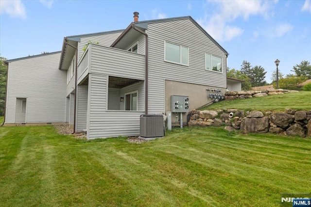 206 Wind Hollow Ct, Mahwah, NJ 07430 - rear view of house with a yard and a balcony