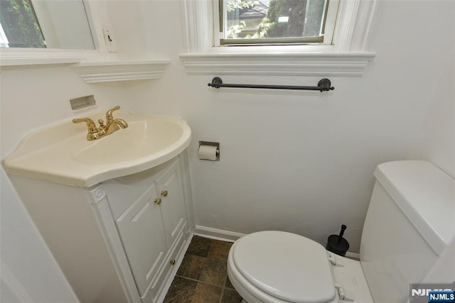 36 Grove St, Waldwick, NJ 07463 - half bathroom with vanity and stone finish flooring