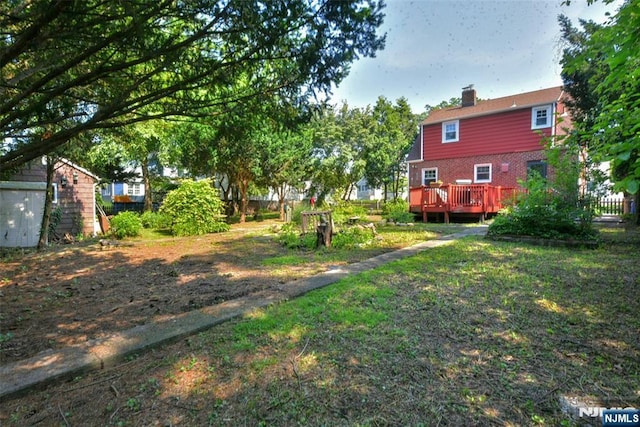 36 Grove St, Waldwick, NJ 07463 - view of grassy yard featuring a wooden deck