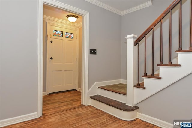 36 Grove St, Waldwick, NJ 07463 - entryway featuring crown molding, wood finished floors, and stairs