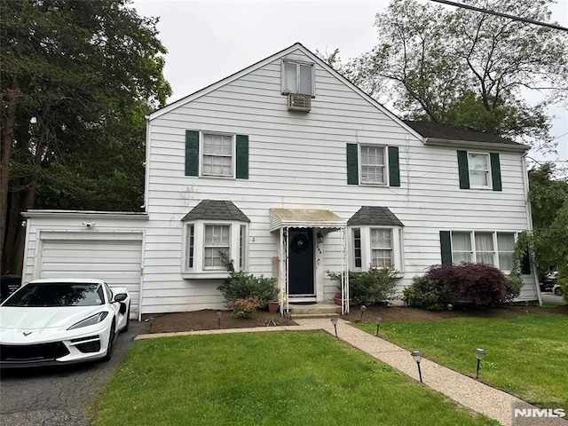364 Kenwood, Paramus, NJ 07652 - view of front of home with a garage, asphalt driveway, and a front yard