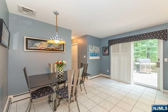 5 Hurley Ct, Wyckoff, NJ 07481 - dining space with light tile patterned flooring, a baseboard heating unit, and baseboard heating