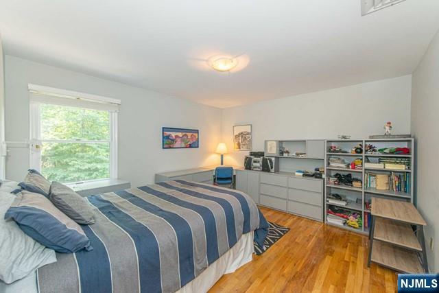 5 Hurley Ct, Wyckoff, NJ 07481 - bedroom with light wood-style flooring