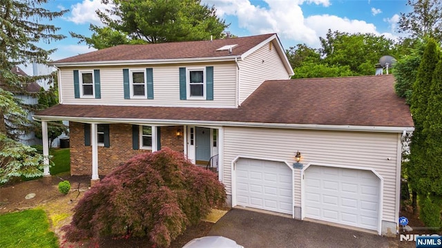 76 Point View Parkway, Wayne, NJ 07470 - traditional home with asphalt driveway, covered porch, roof with shingles, and an attached garage