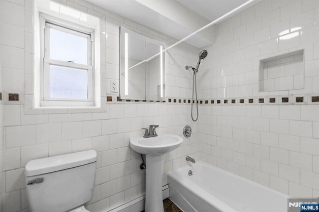 8829 Kennedy Blvd Unit E5, North Bergen, NJ 07047 - full bath featuring tub / shower combination and tile walls