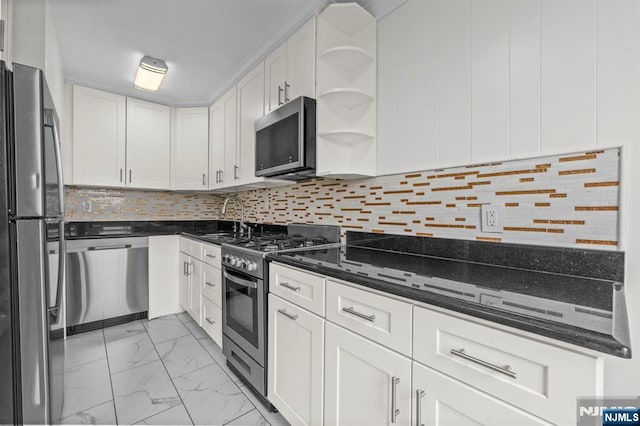 8829 Kennedy Blvd Unit E5, North Bergen, NJ 07047 - kitchen with appliances with stainless steel finishes, light marble finish flooring, open shelves, white cabinetry, and backsplash