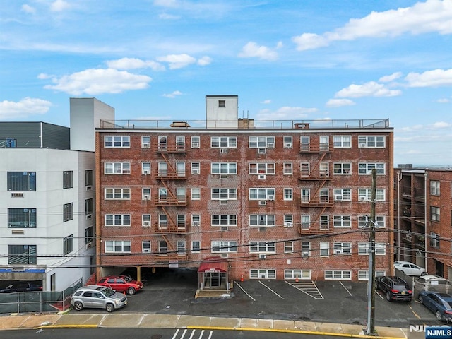 8829 Kennedy Blvd Unit E5, North Bergen, NJ 07047 - view of apartment building / complex featuring uncovered parking