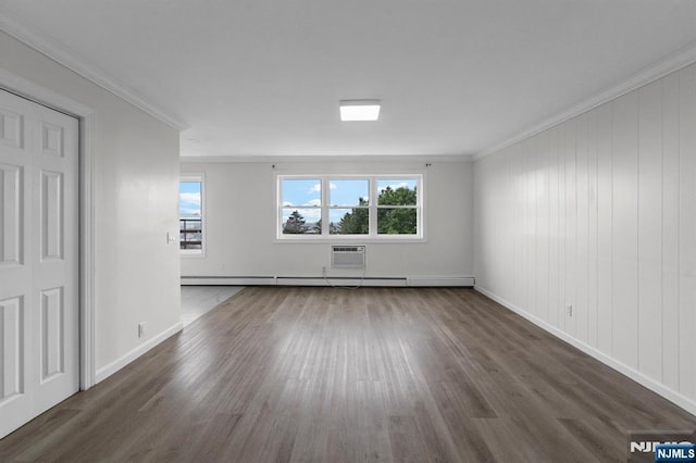 8829 Kennedy Blvd Unit E5, North Bergen, NJ 07047 - unfurnished room featuring wood finished floors, ornamental molding, and baseboard heating
