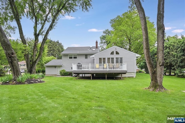39 Terrace Rd, Wayne, NJ 07470 - back of house featuring a wooden deck, a lawn, and a chimney