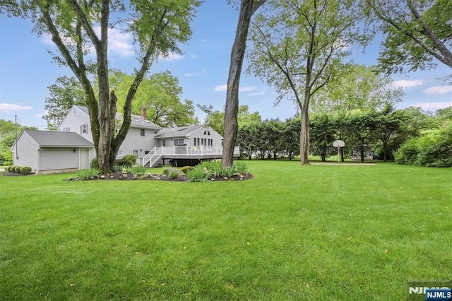 39 Terrace Rd, Wayne, NJ 07470 - view of grassy yard with a deck
