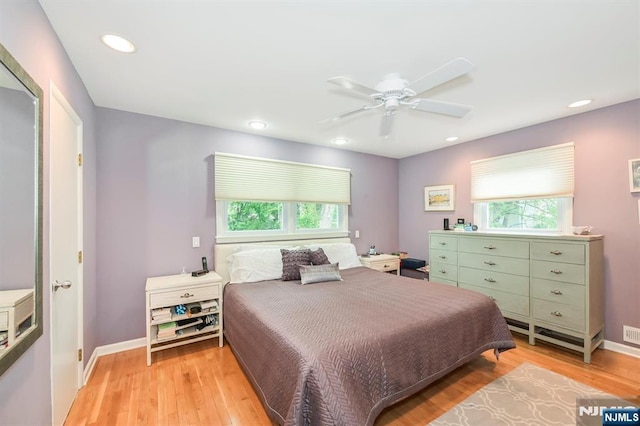 39 Terrace Rd, Wayne, NJ 07470 - bedroom with multiple windows, light wood-style floors, a ceiling fan, and recessed lighting