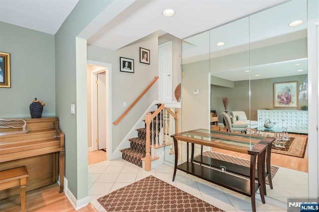39 Terrace Rd, Wayne, NJ 07470 - staircase with tile patterned floors and recessed lighting
