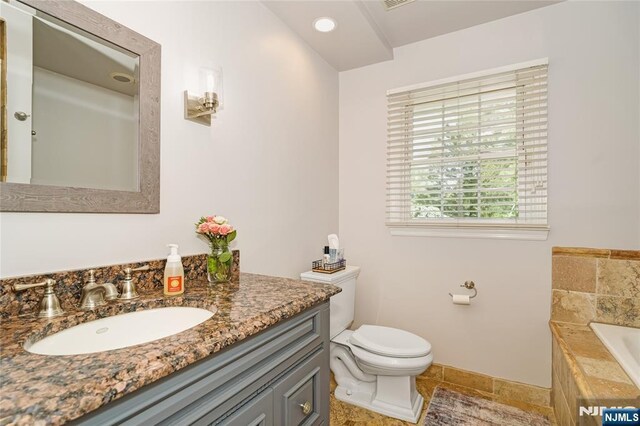17 Windham Pl, Glen Rock, NJ 07452 - bathroom featuring a garden tub and vanity