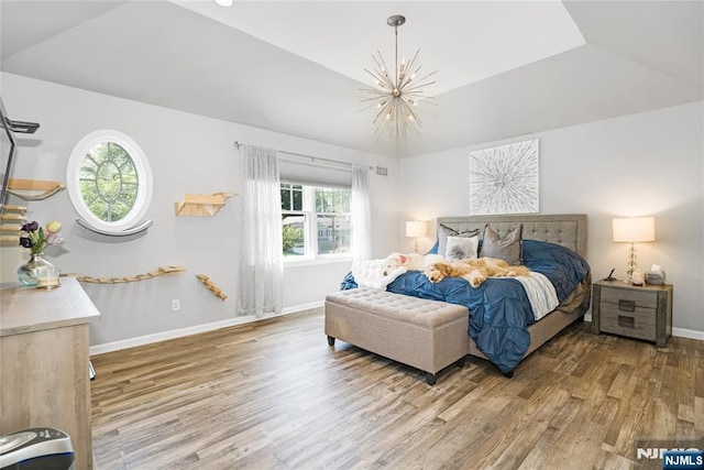 17 Windham Pl, Glen Rock, NJ 07452 - bedroom featuring a chandelier, wood finished floors, and multiple windows