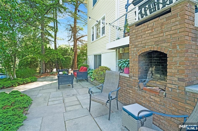 17 Windham Pl, Glen Rock, NJ 07452 - view of patio / terrace featuring an outdoor brick fireplace