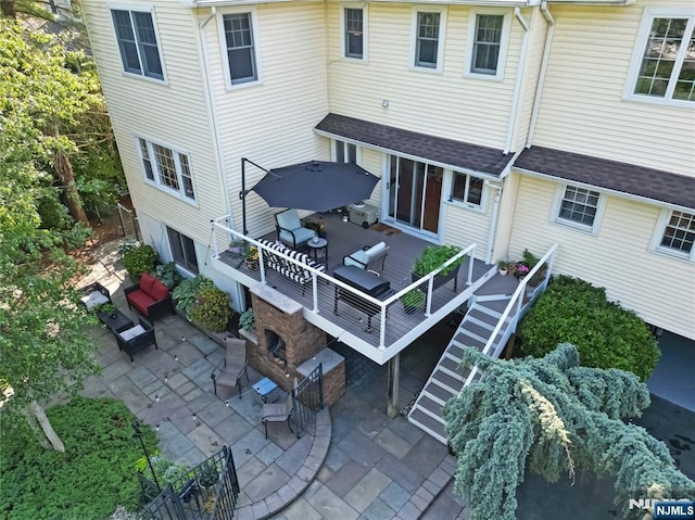 17 Windham Pl, Glen Rock, NJ 07452 - back of property with a patio area and an outdoor hangout area