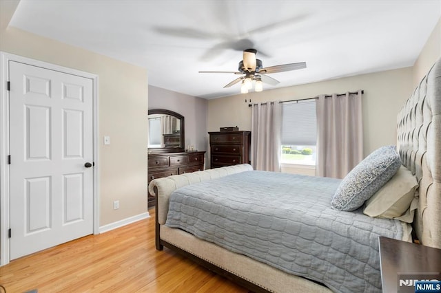 39 Division Ave, Hasbrouck Heights, NJ 07604 - bedroom with light wood-type flooring and a ceiling fan