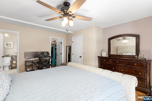 39 Division Ave, Hasbrouck Heights, NJ 07604 - bedroom with a spacious closet, ensuite bathroom, a ceiling fan, and a closet
