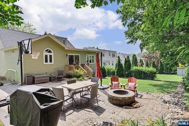 39 Division Ave, Hasbrouck Heights, NJ 07604 - view of patio with a fire pit, a grill, and outdoor dining area